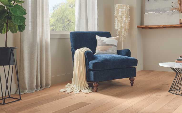 white oak flooring in hygge-style living room with cozy corner